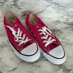 Hot pink low top Converse